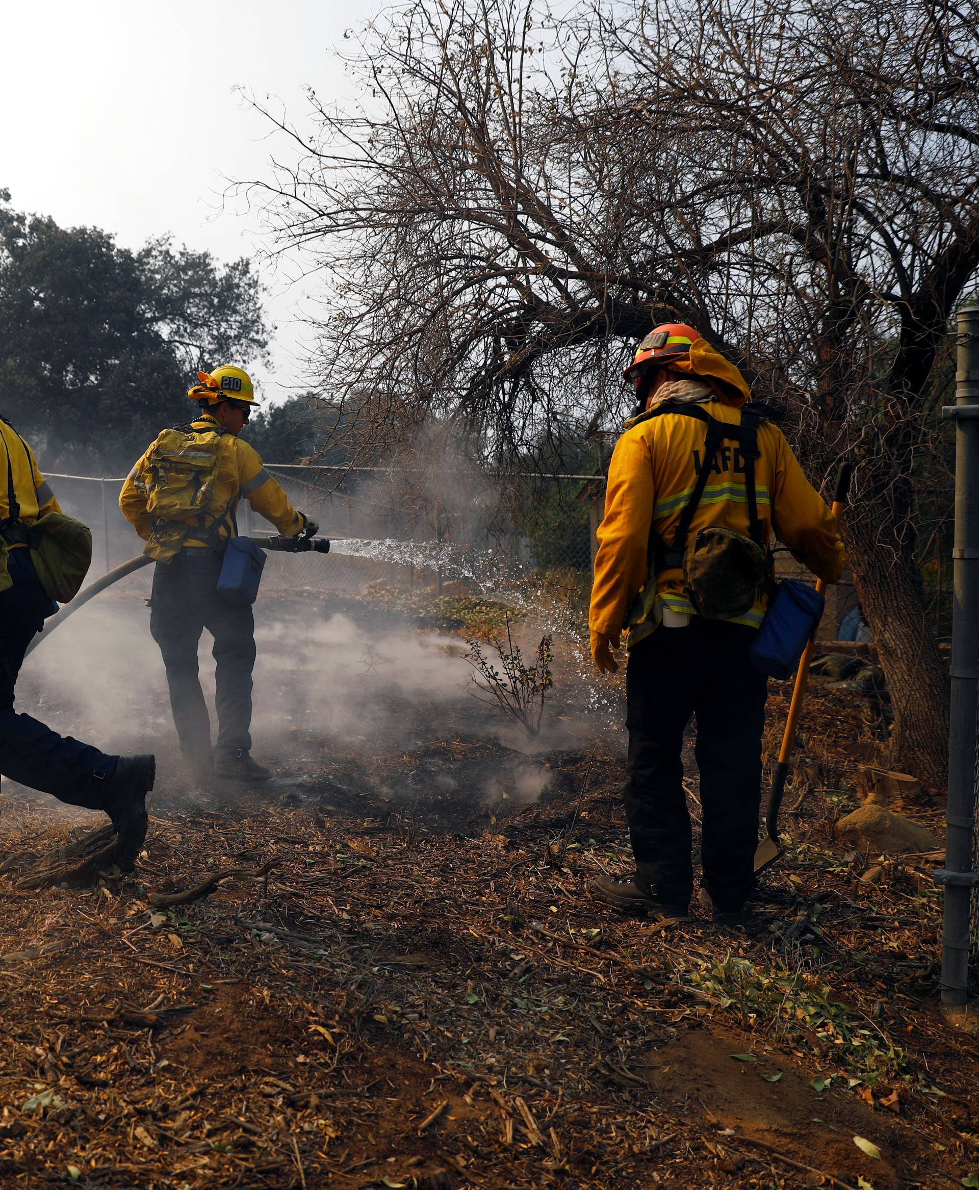 Firefighters battle the Peak fire in Simi Valley