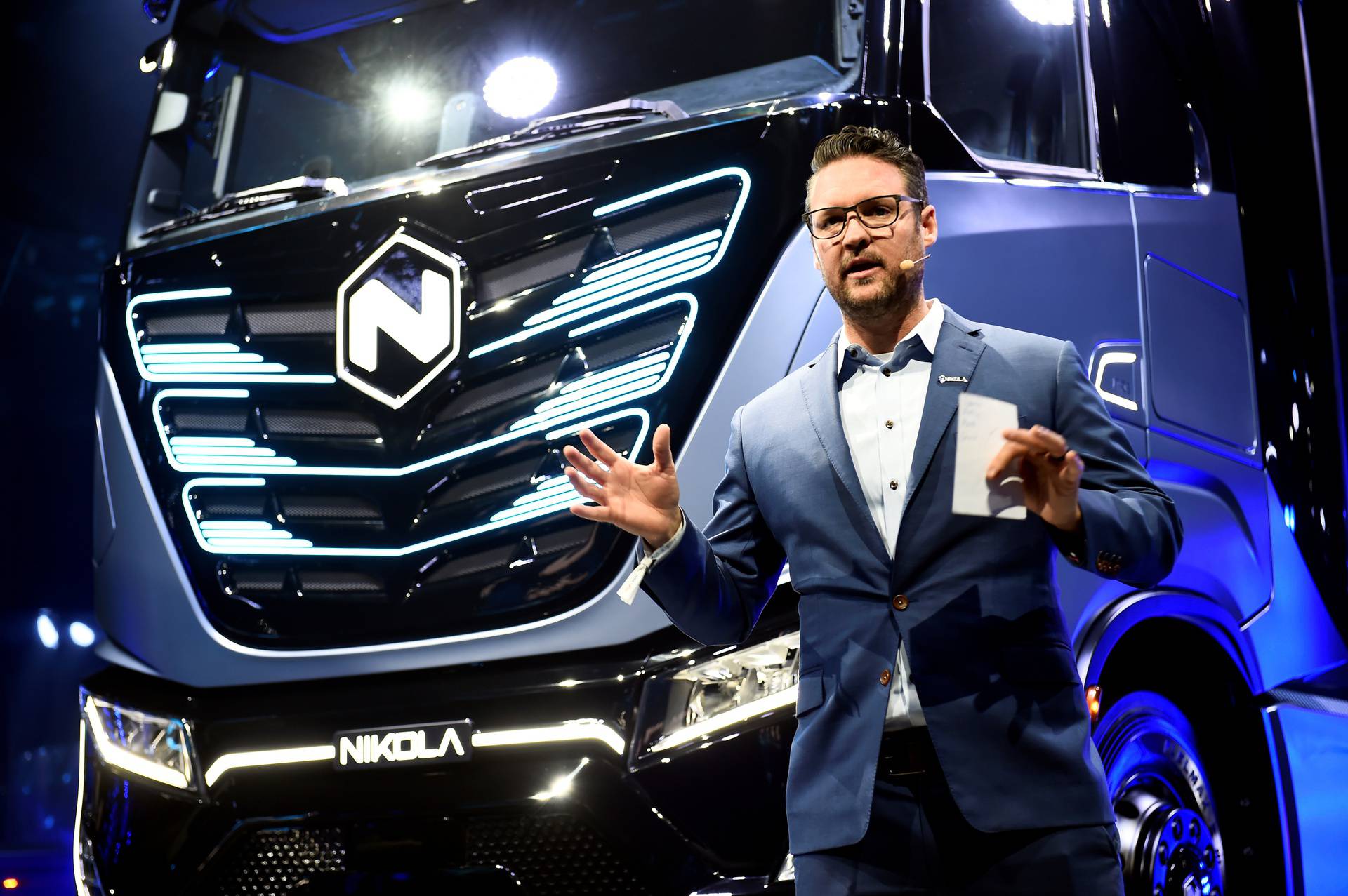 FILE PHOTO: CEO and founder of U.S. Nikola, Trevor Milton speaks during presentation of its new full-electric and hydrogen fuel-cell battery trucks in partnership with CNH Industrial, at an event in Turin