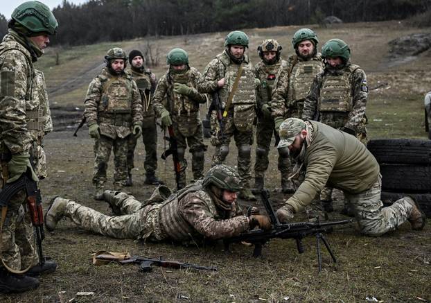 Ukrainian servicemen attend a training near the town of Pokrovsk