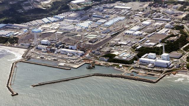 An aerial view shows the tsunami-crippled Fukushima Daiichi nuclear power plant which started releasing treated radioactive water into the Pacific Ocean, in Okuma town