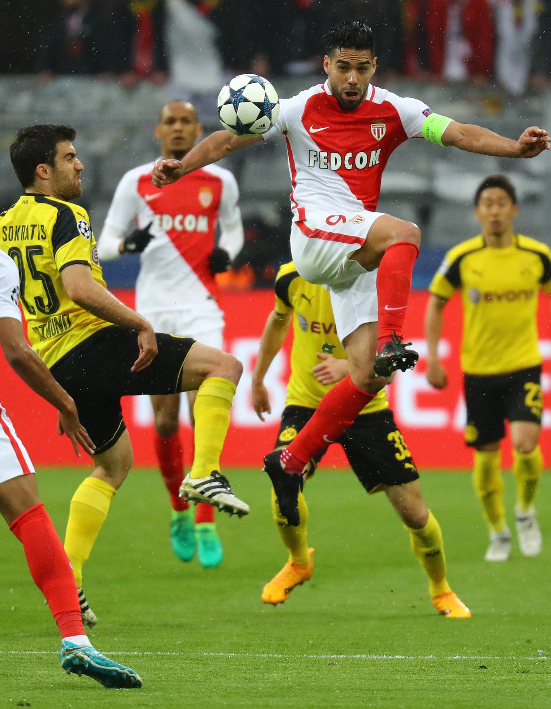 Monaco's Radamel Falcao in action with Borussia Dortmund's Sokratis Papastathopoulos