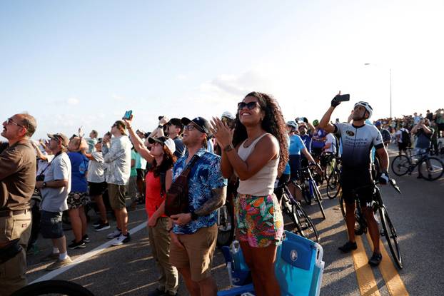 FILE PHOTO: People gather to watch the launch of the Artemis II mission in Titusville