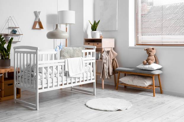 Interior,Of,Light,Children's,Bedroom,With,Baby,Crib,,Table,And