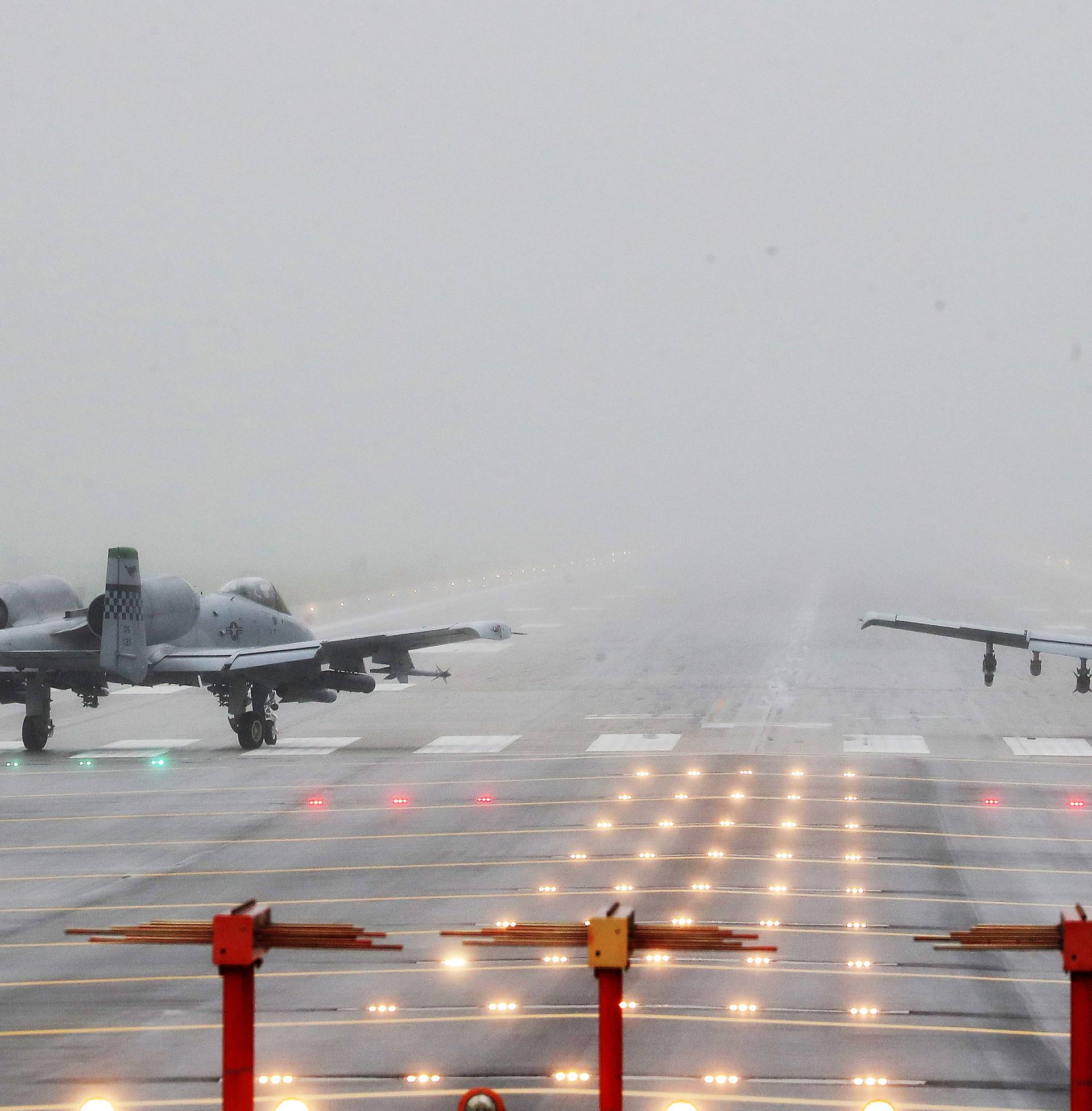 U.S. A-10 aircrafts wait to take off at the Osan U.S. Air Base in Pyeongtaek