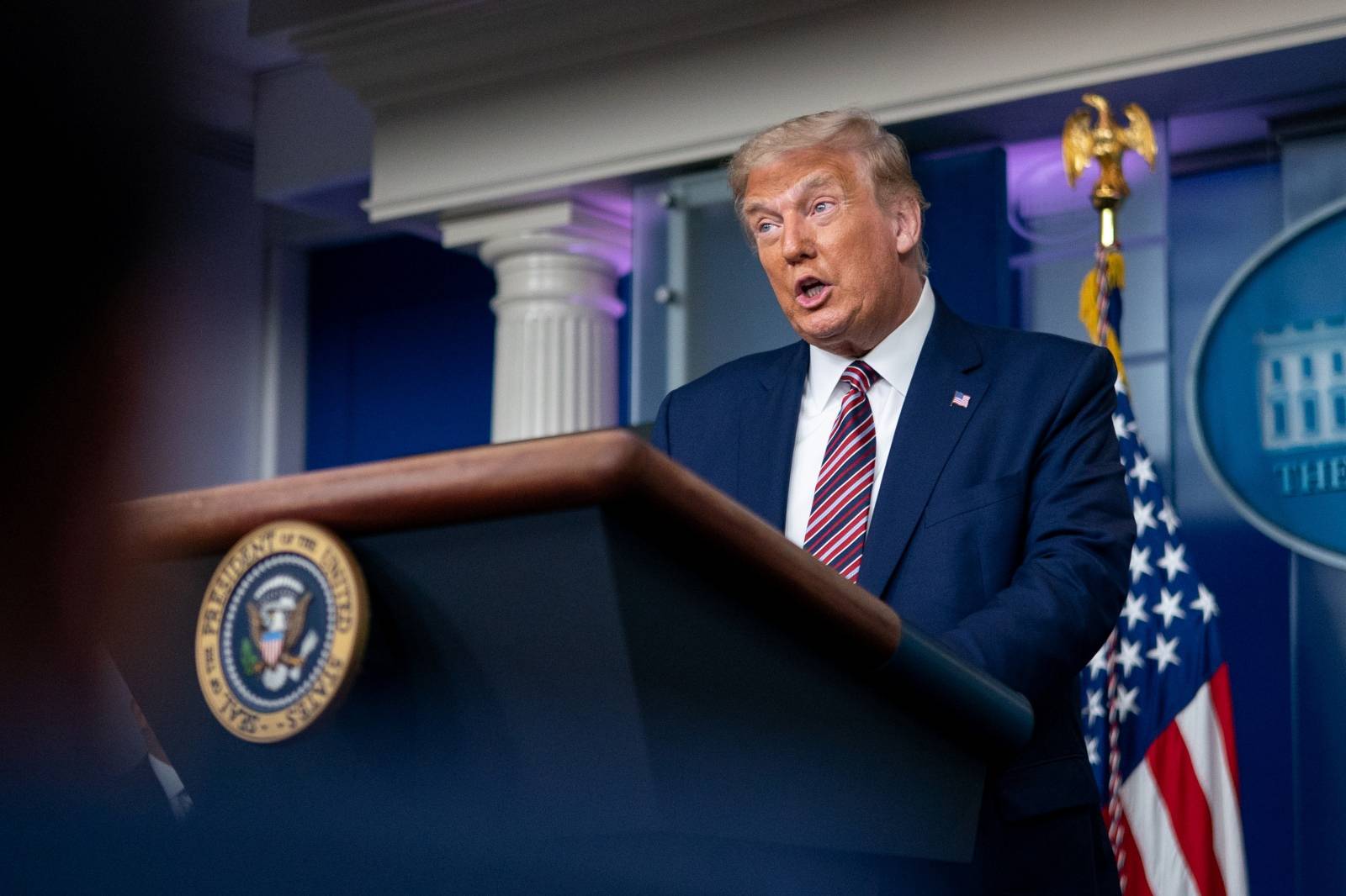 U.S. President Trump speaks to reporters during a news conference