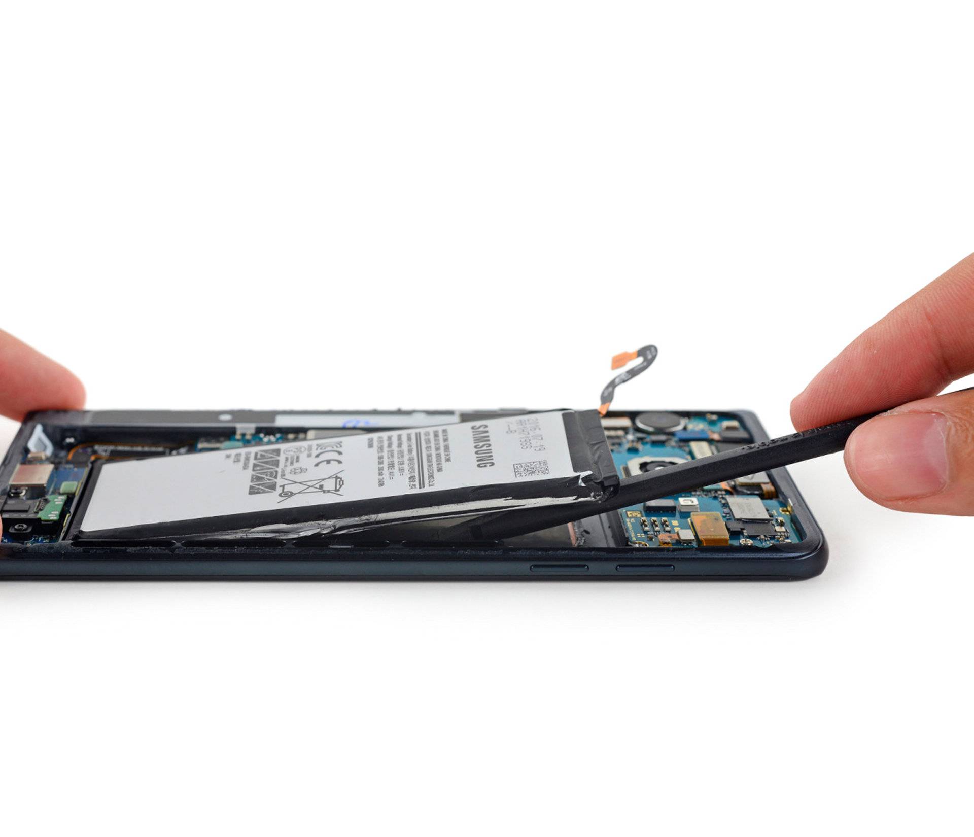 Samsung Galaxy Note 7 smartphone battery is removed during a iFixit's teardown of the phone