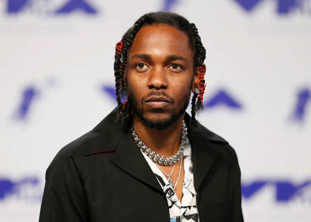 FILE PHOTO: Musician Kendrick Lamar arrives at the 2017 MTV Video Music Awards in Inglewood