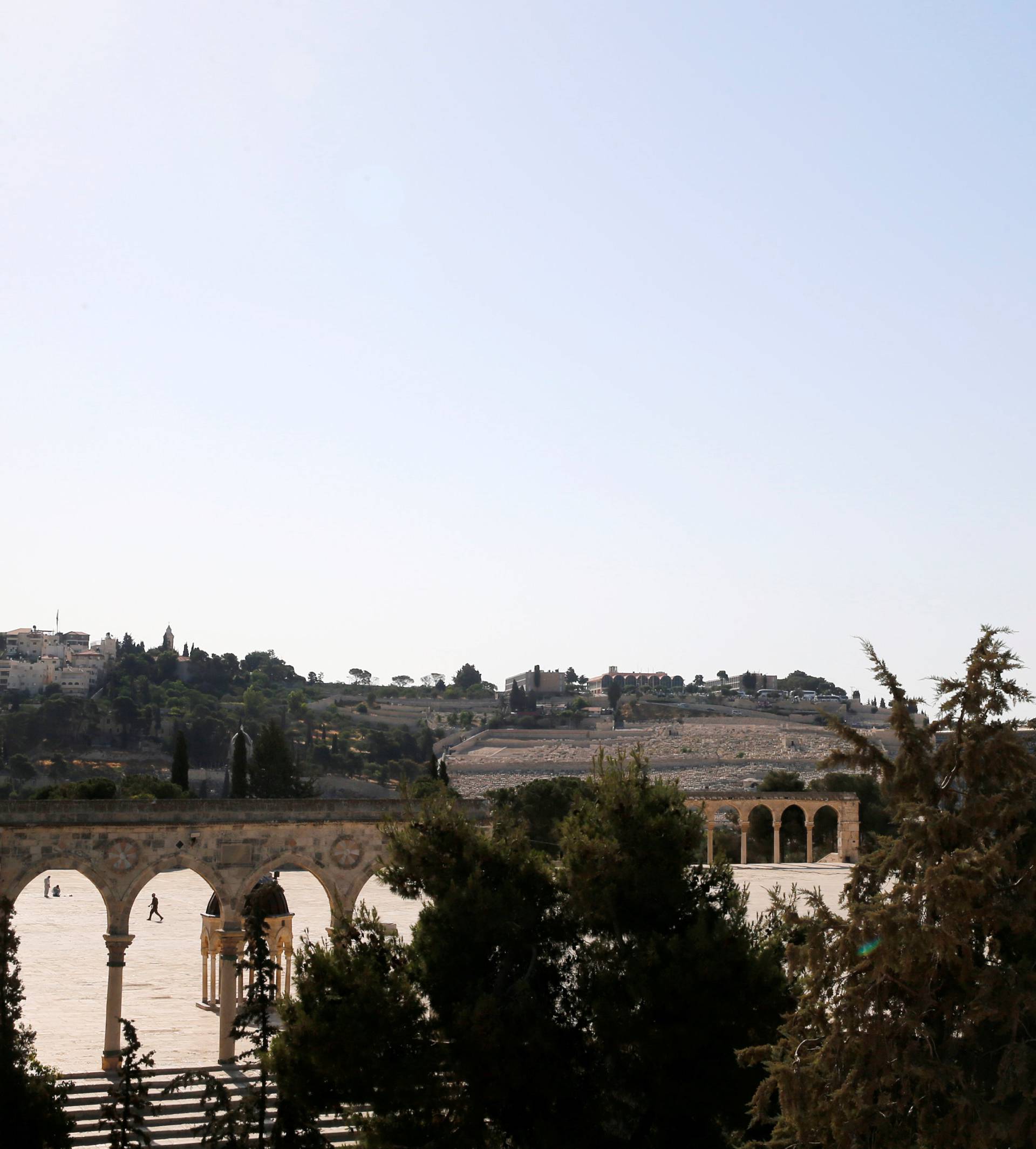 Israeli policemen secure the scene of the shooting attack at the compound known to Muslims as al-Haram al-Sharif and to Jews as Temple Mount, in Jerusalem's Old City