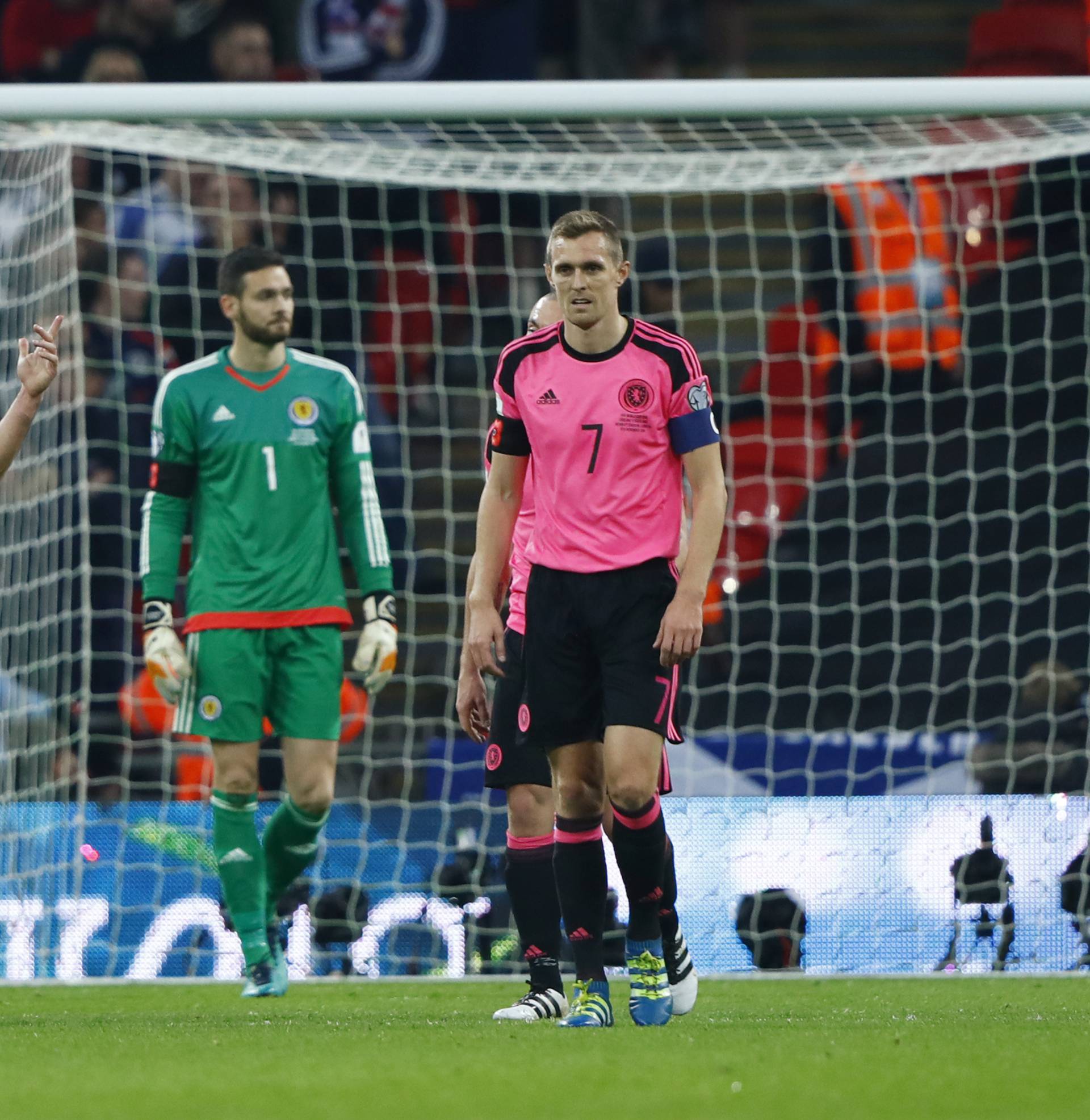 Scotland's Craig Gordon, Robert Snodgrass and Darren Fletcher look dejected after England's Daniel Sturridge scores their first goal