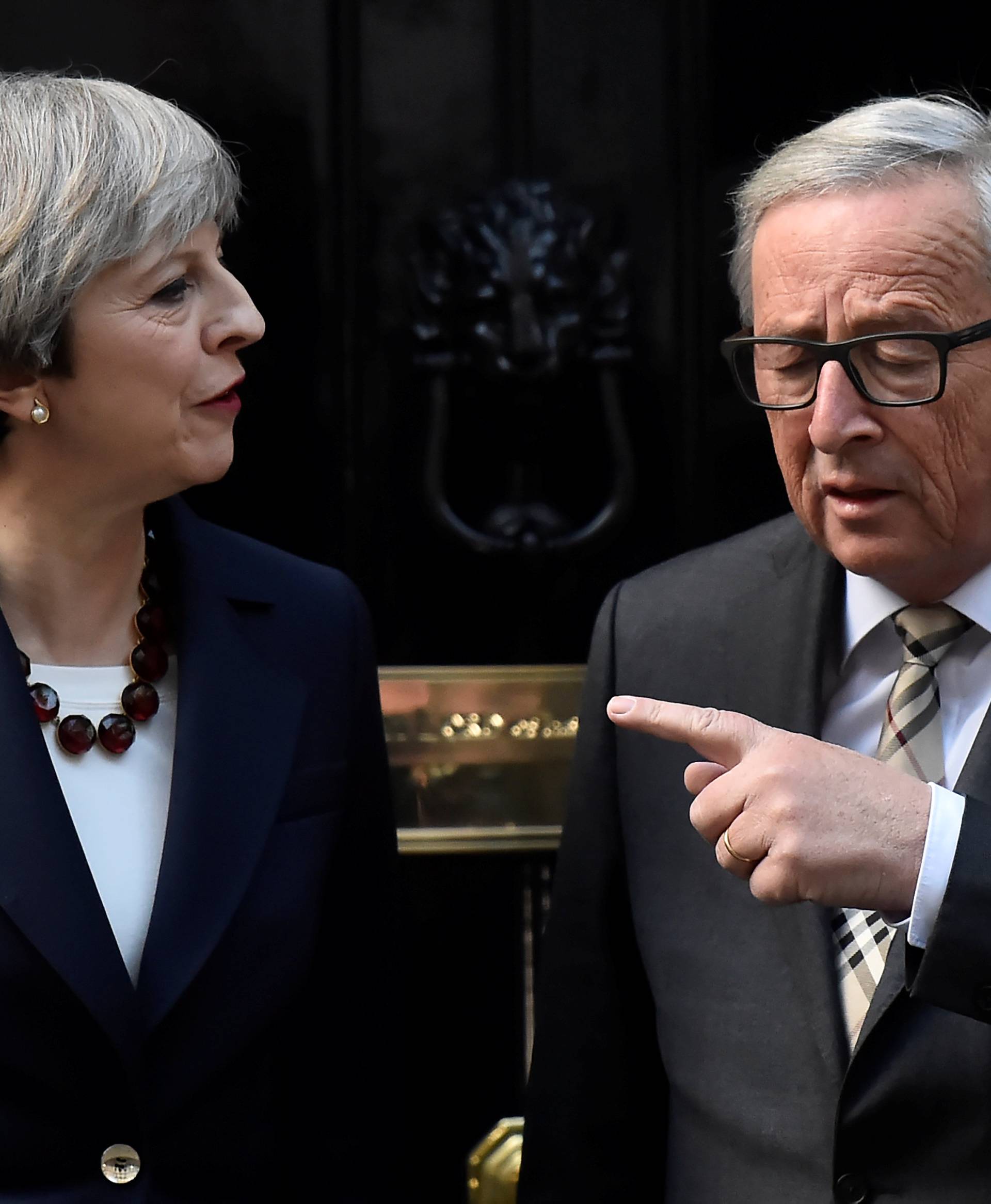 Britain's Prime Minister Theresa May welcomes Head of the European Commission, President Juncker to Downing Street in London