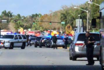 Police cars are seen in Coral Springs, Florida