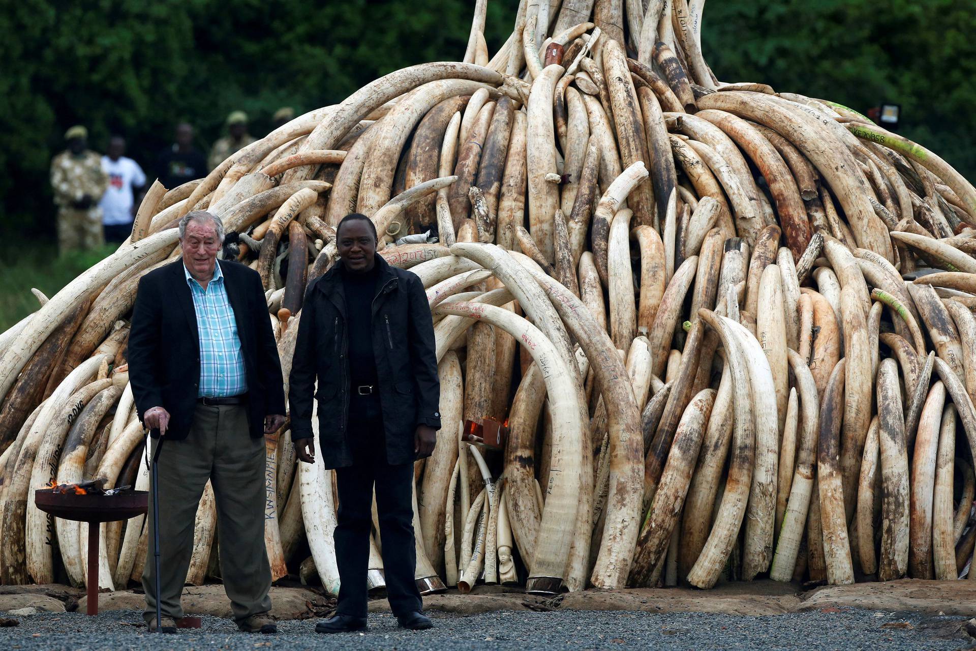 FILE PHOTO: Kenyatta and Leakey pose for the press near Nairobi