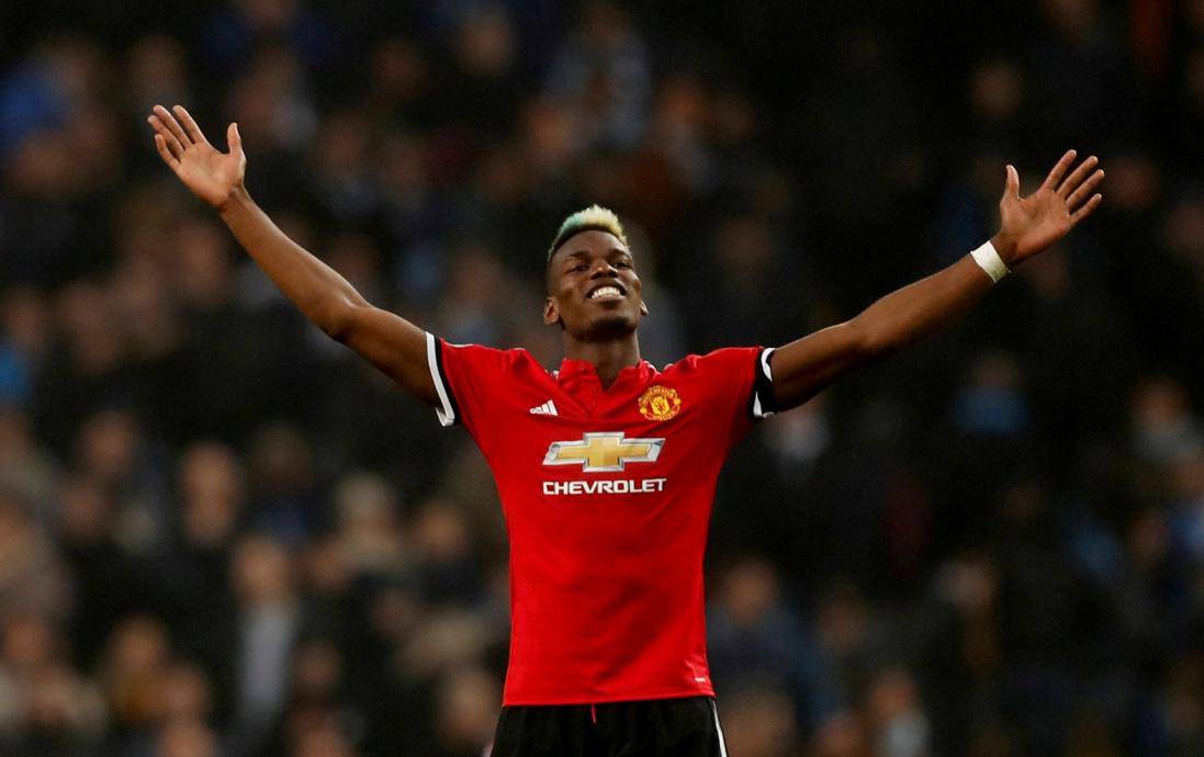 FILE PHOTO: Manchester United midfielder Paul Pogba celebrates after his match-winning display against rivals Manchester City at the Etihad Stadium