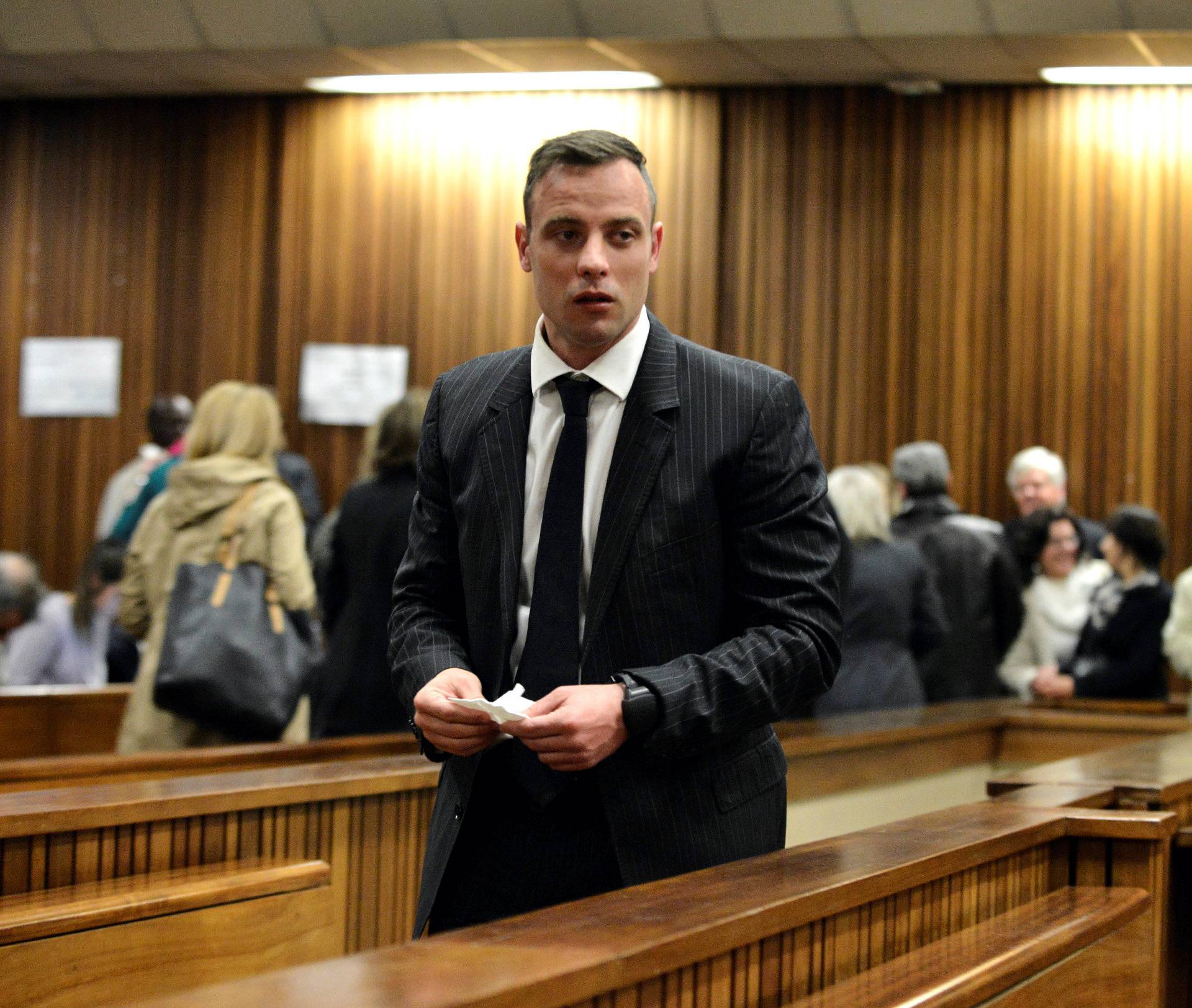 Former Paralympian Oscar Pistorius attends his sentencing for the murder of Reeva Steenkamp at the Pretoria High Court