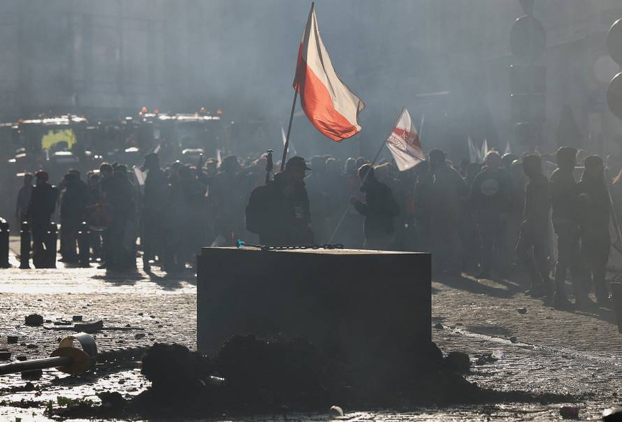 Farmers rally in a large-scale protest in Brussels as leaders meet in EU summit