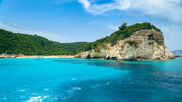 Corfu, Paxos Coast, high cliffs over the blue sea.