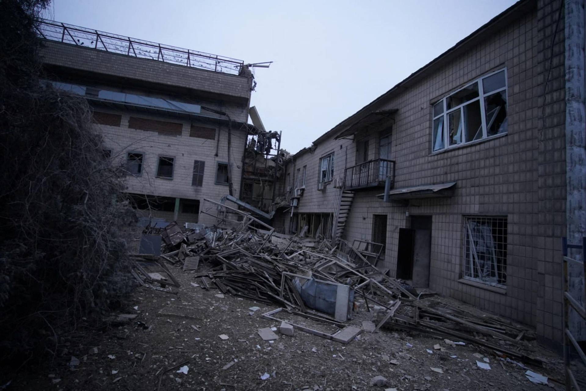 A view shows an affected area following an attack on a television tower in Kyiv