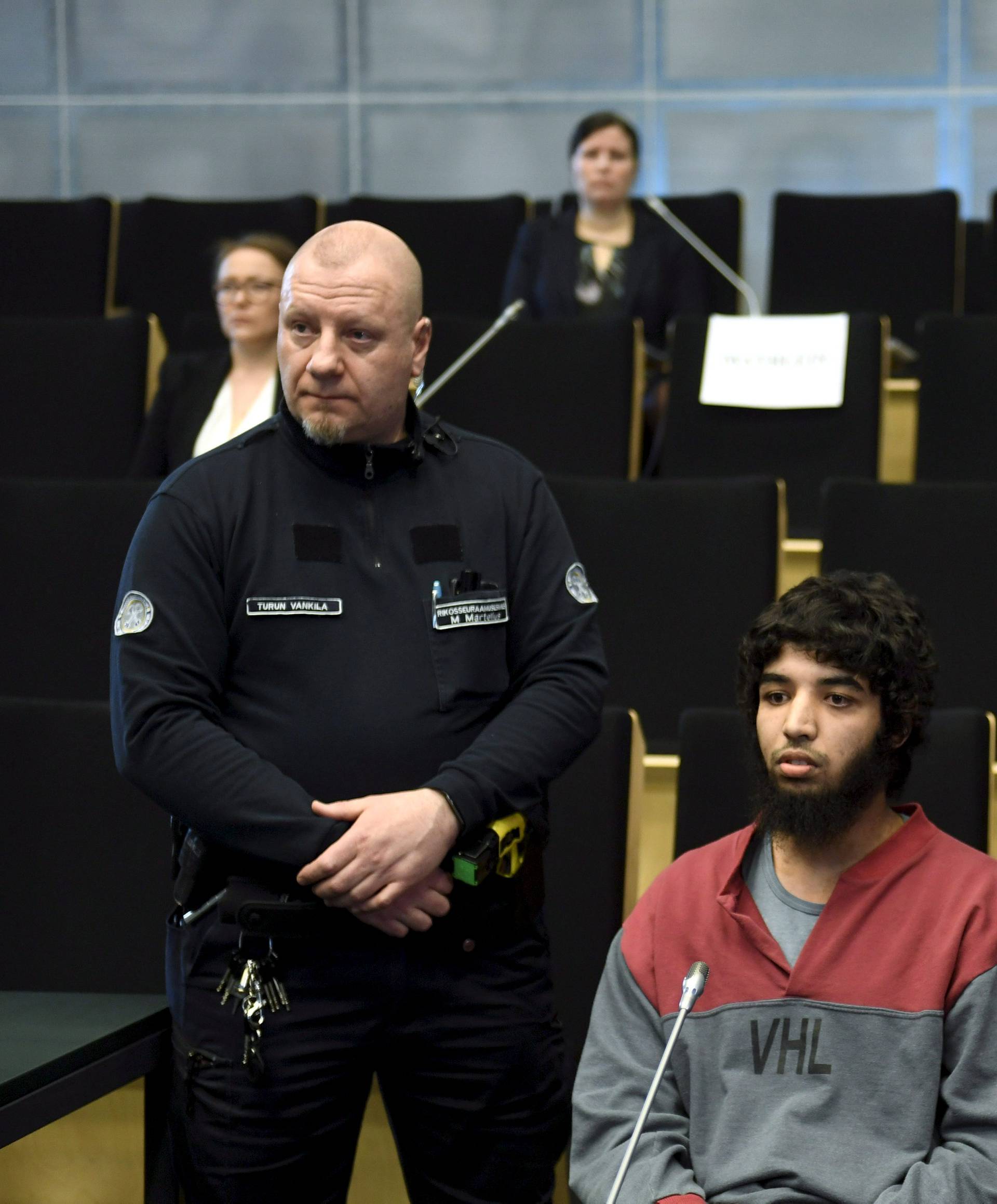 Suspect Moroccan Abderrahman Bouanane attends his trial in Turku