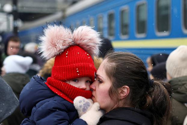 Refugees flee Russia's invasion of Ukraine, in Lviv