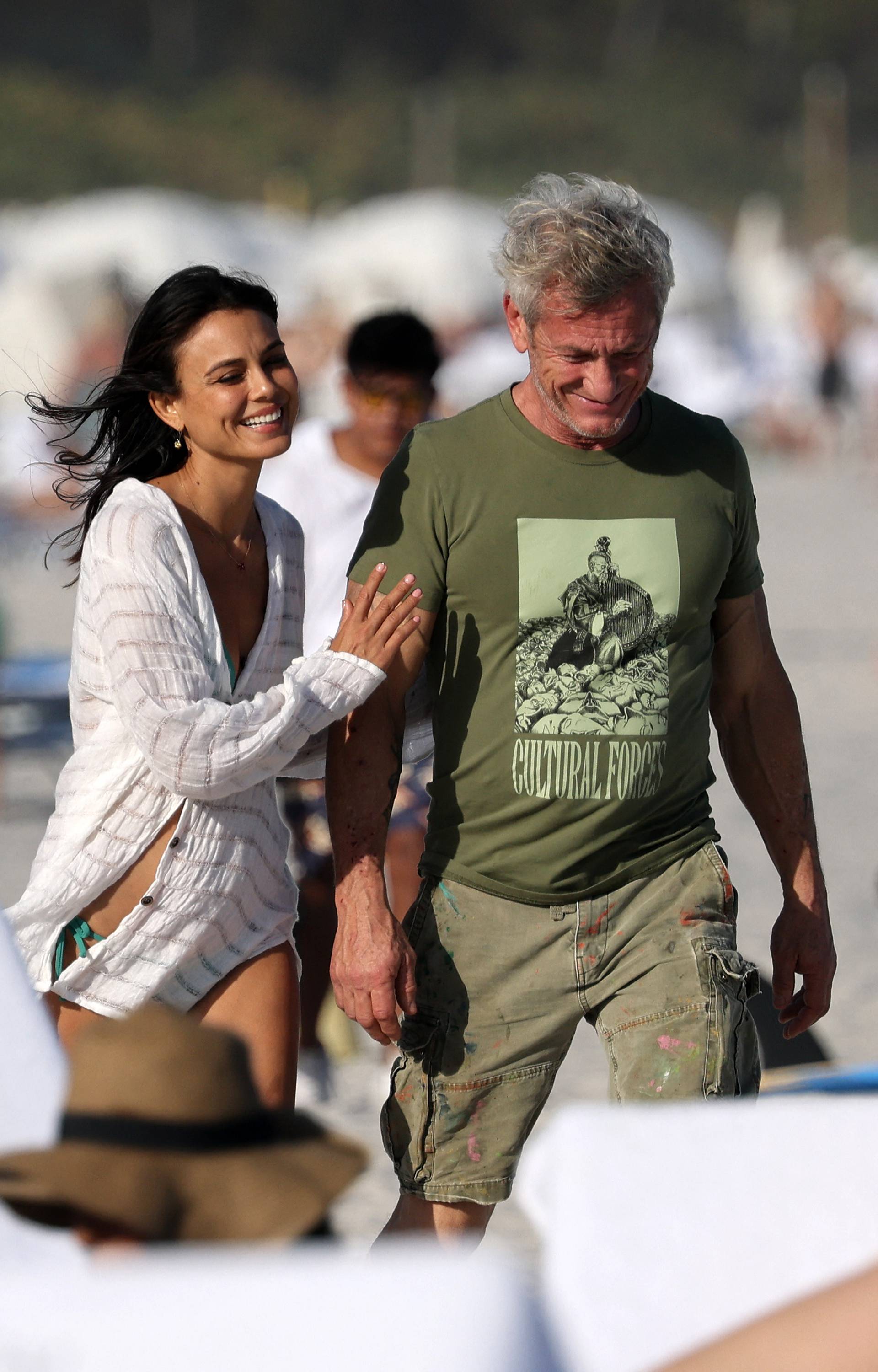 EXCLUSIVE: Sean Penn takes a cozy beach stroll with stunning actress Nathalie Kelley during Art Basel in Miami