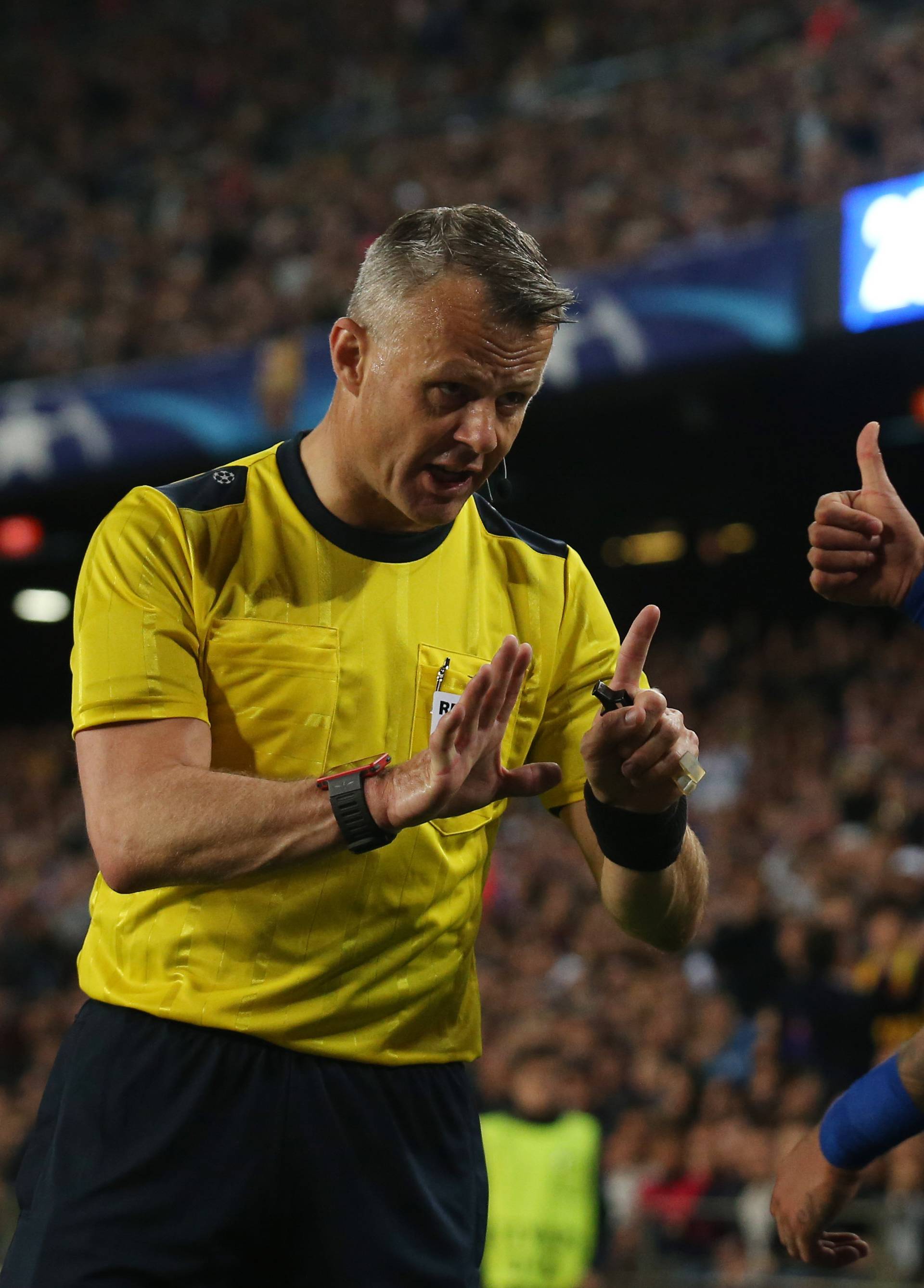 Barcelona's Neymar gestures to referee Bjorn Kuipers