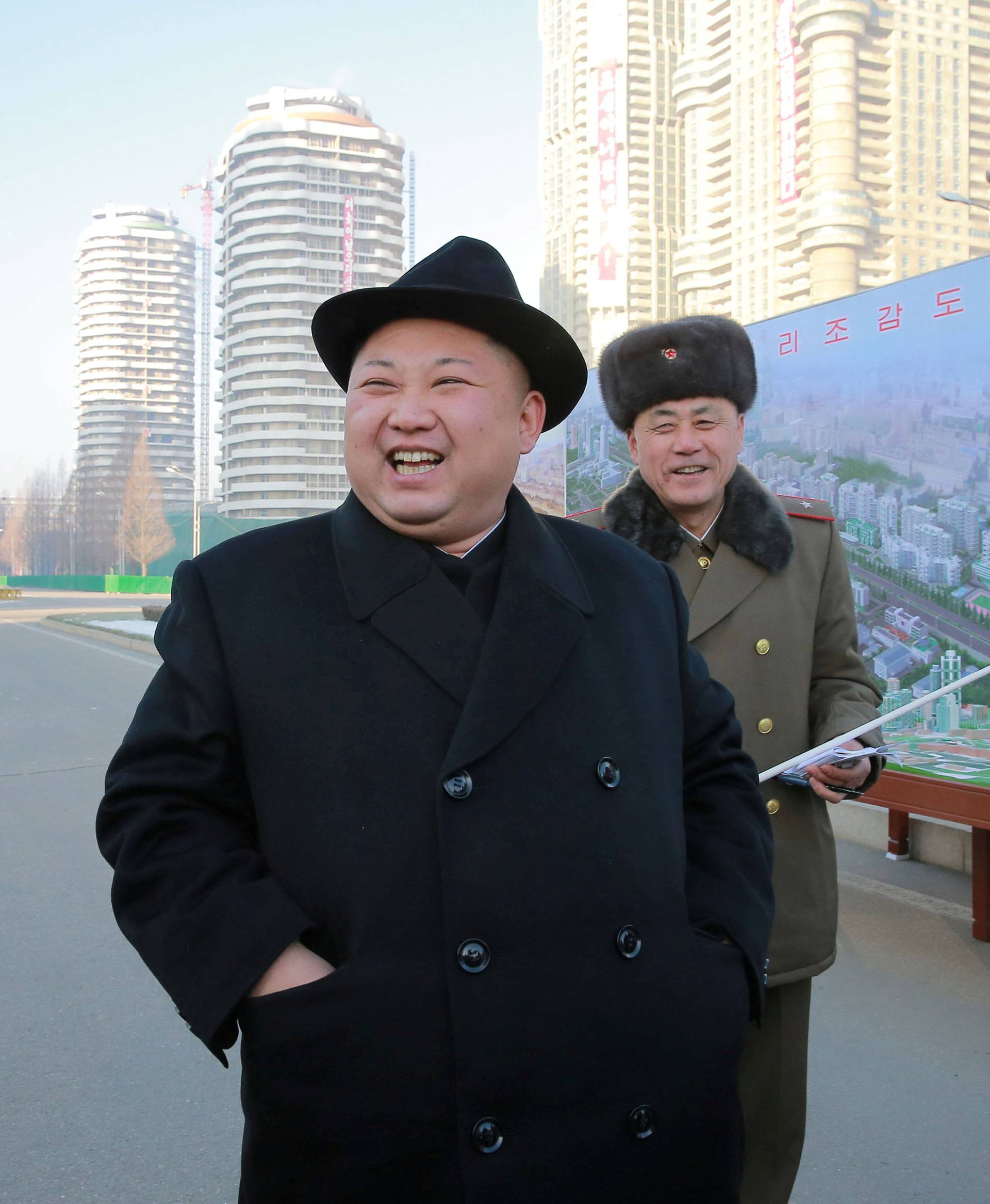 FILE PHOTO: KCNA photo of North Korean leader Kim Jong Un inspecting the construction site of Ryomyong Street
