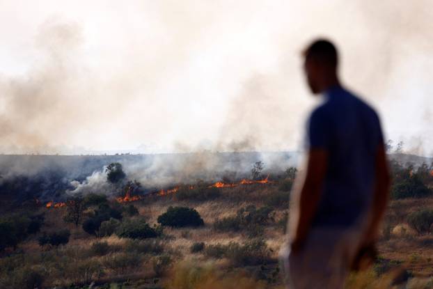 A wildfire burns on the outskirts of Valmojado