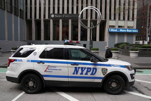 A police car is pictured parked outside Fox News headquarters in New York City