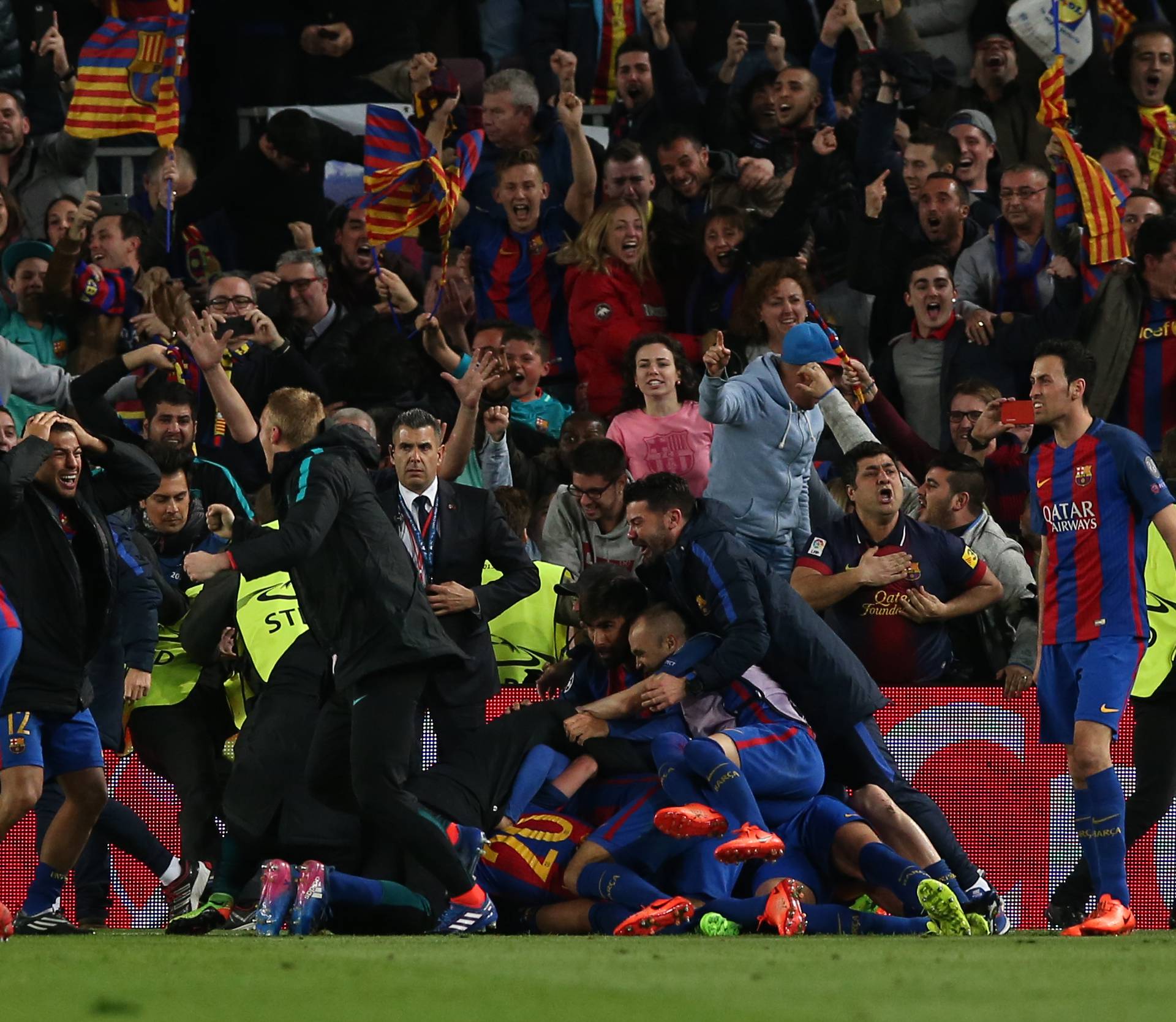 Barcelona's Sergi Roberto celebrates scoring their sixth goal with team mates and fans