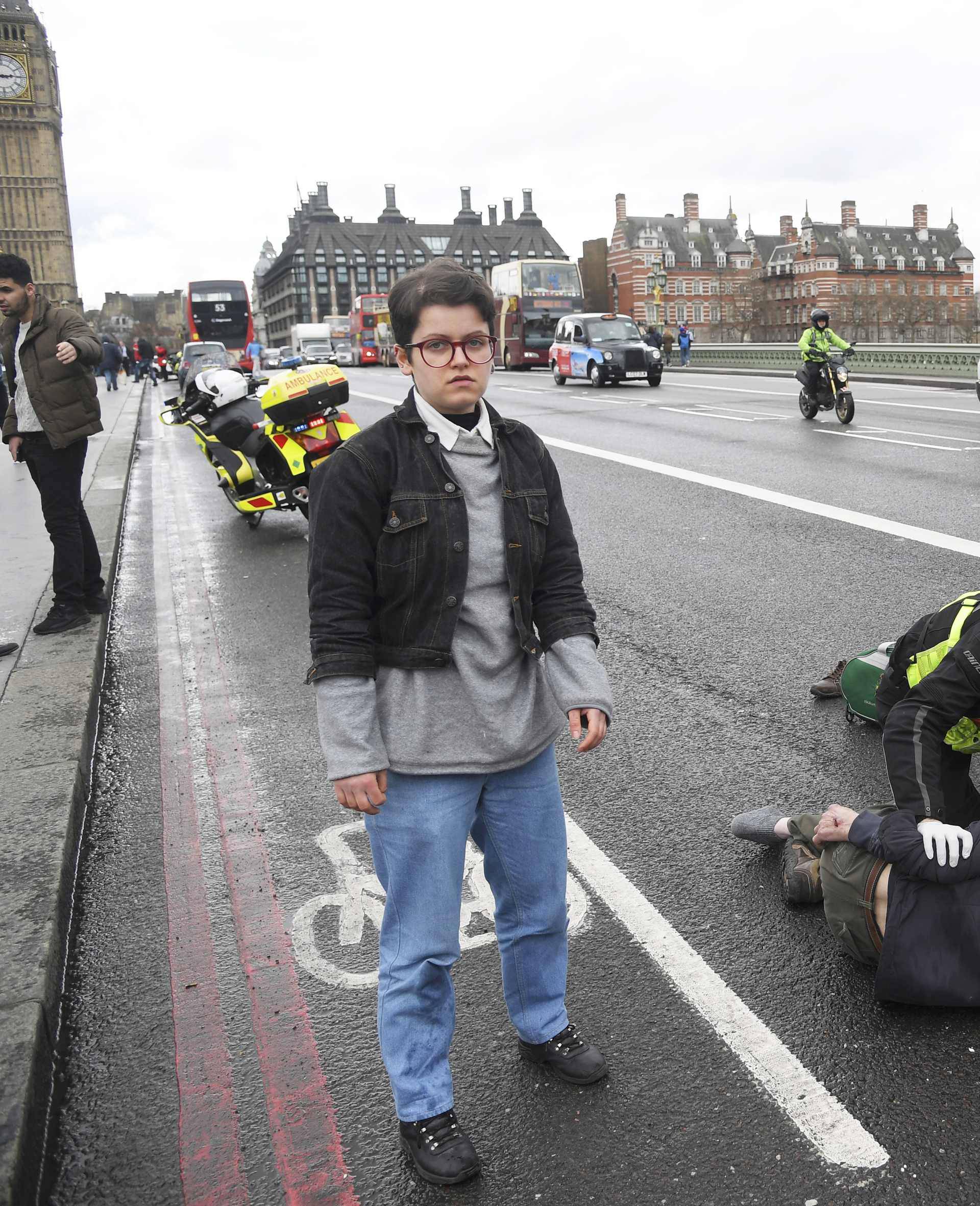 Injured people are assisted after an incident on Westminster Bridge in London