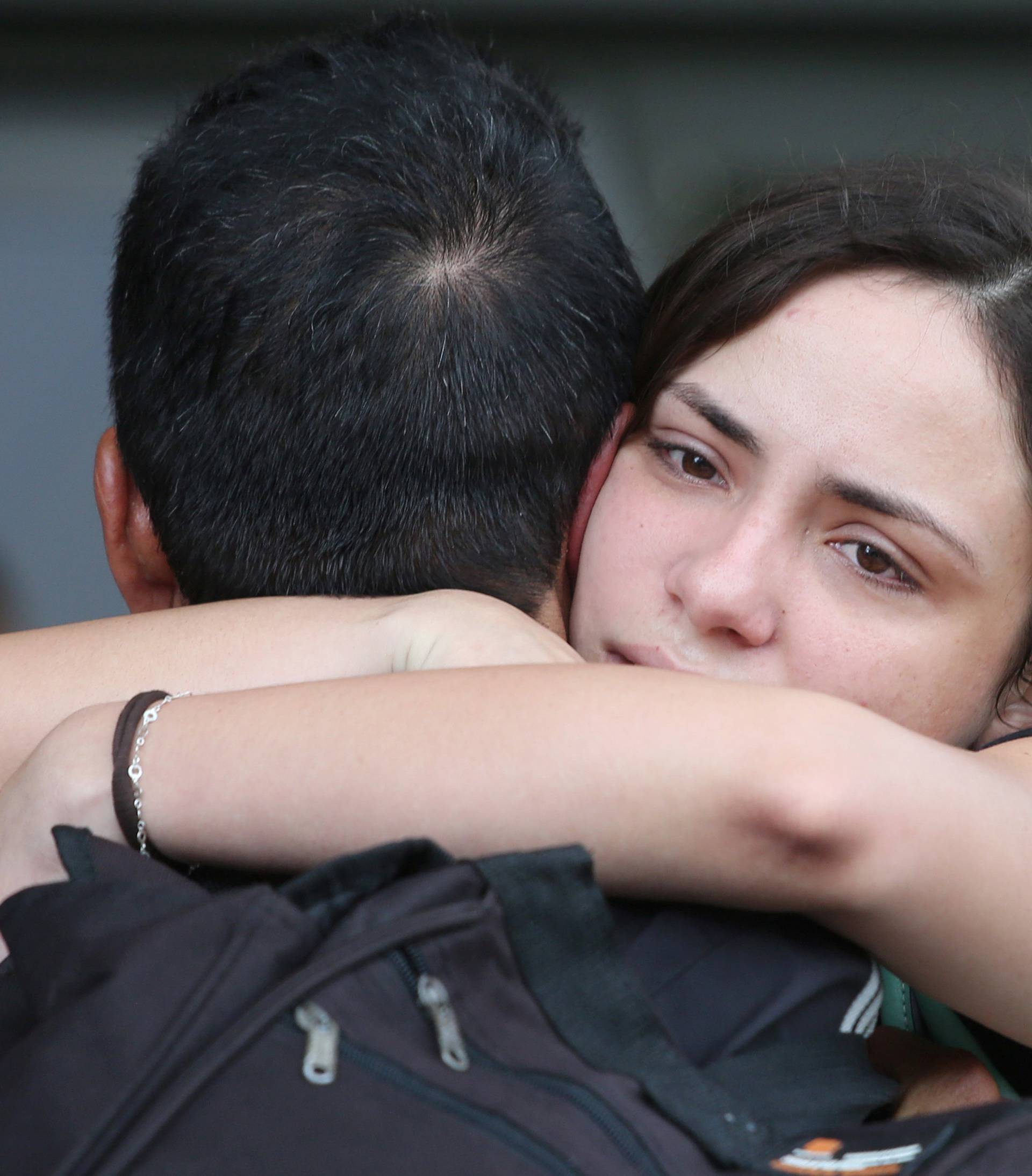 Relatives of victims of the Boeing 737 plane that crashed after taking off from Havana's main airport yesterday, react at a hotel in Havana