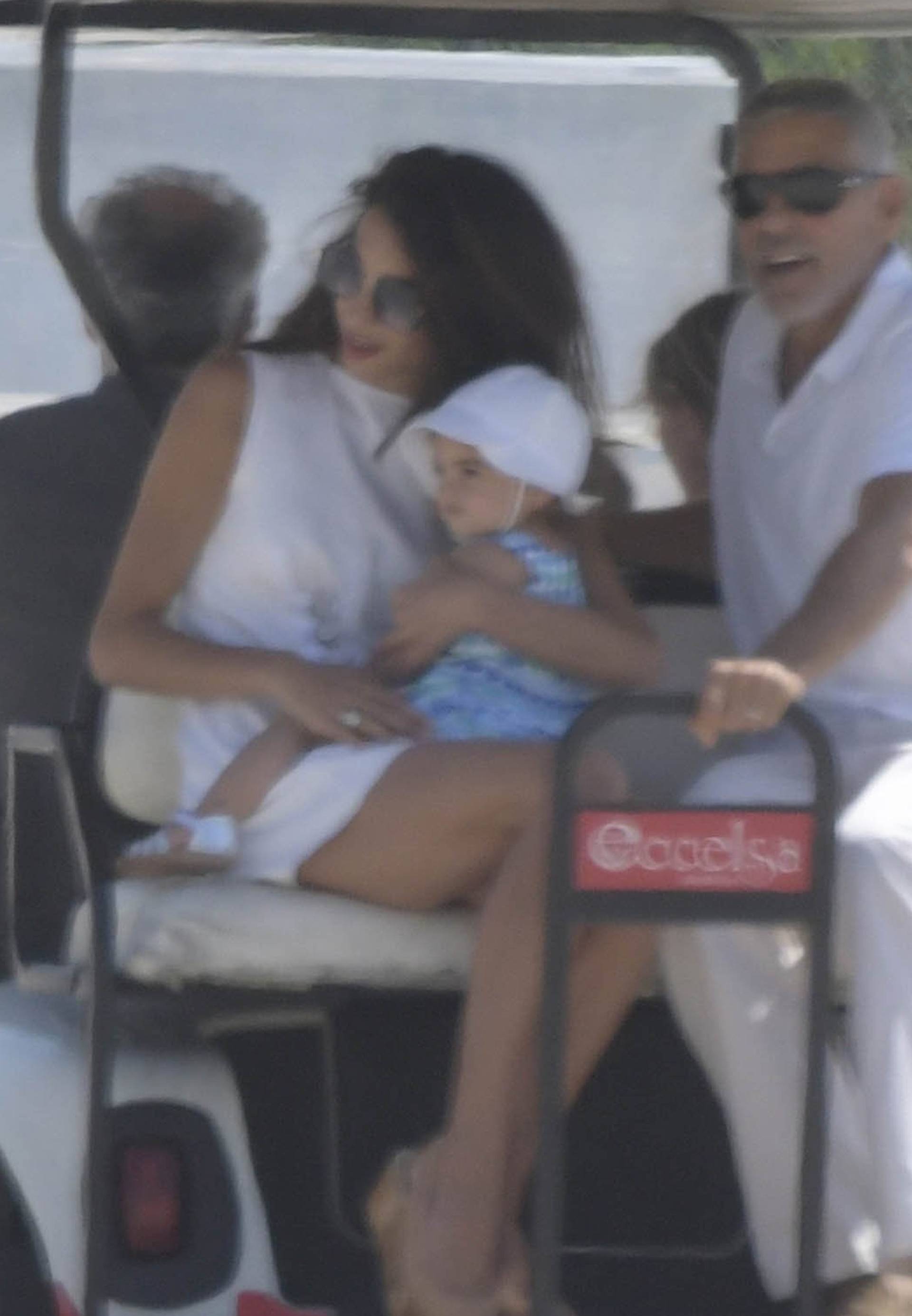 George Clooney departing from Olbia with wife Amal and the twins