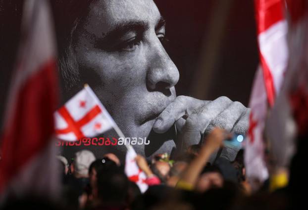 FILE PHOTO: Supporters of Georgian ex-president Mikheil Saakashvili hold a rally in Tbilisi