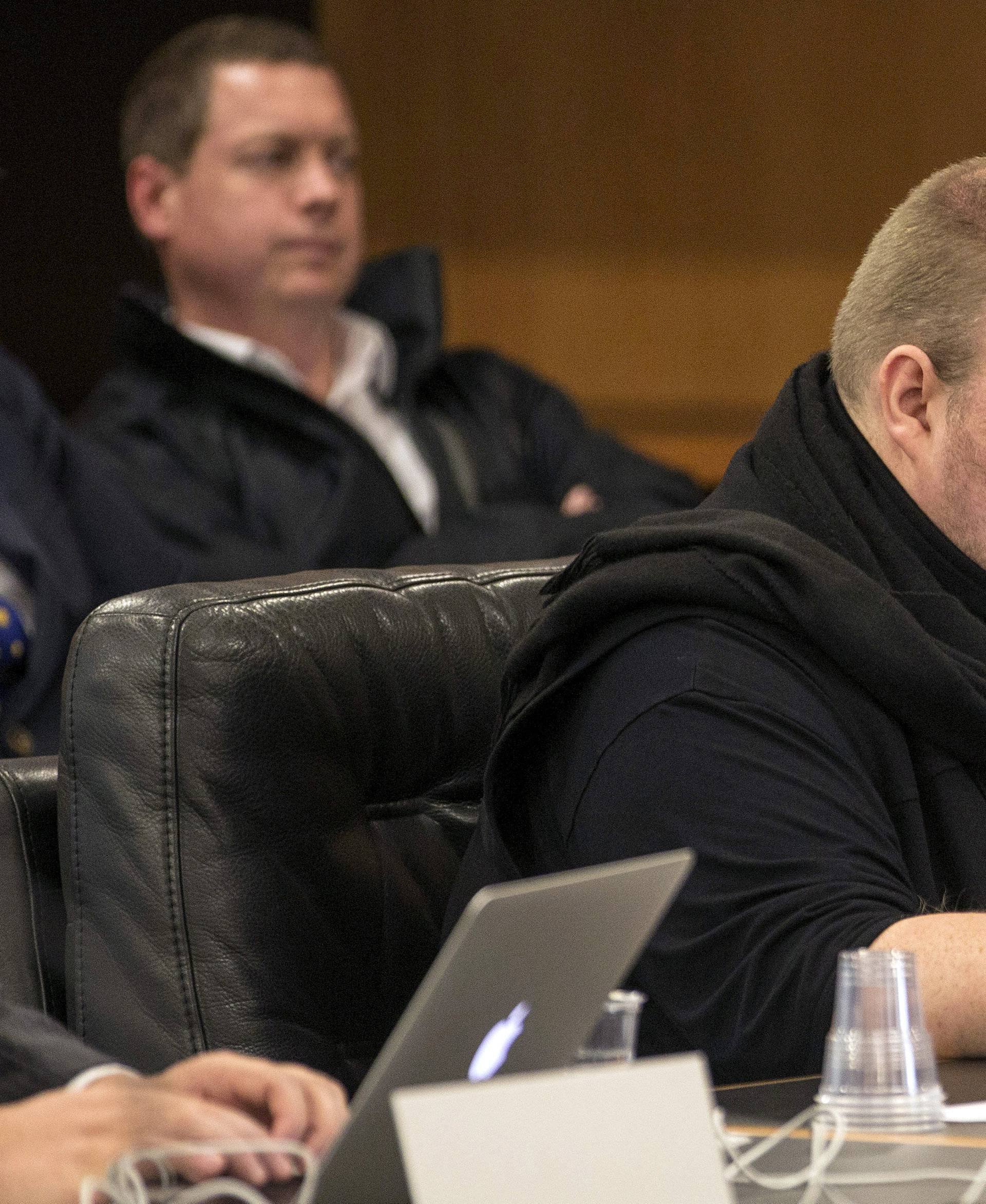 FILE PHOTO - German tech entrepreneur Kim Dotcom sits in a chair during a court hearing in Auckland, New Zealand