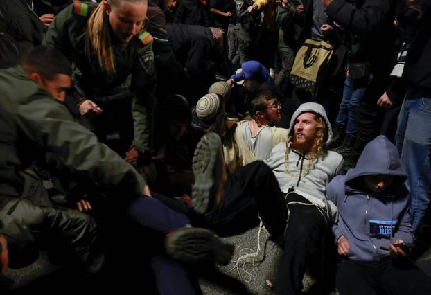Israelis protest a ceasefire deal, in Jerusalem