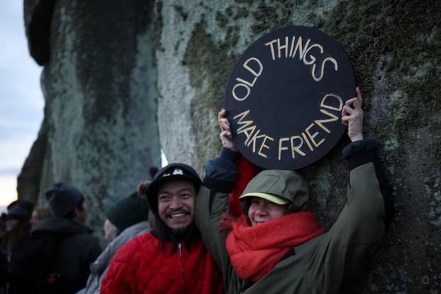 Winter solstice celebrations during sunrise at Stonehenge