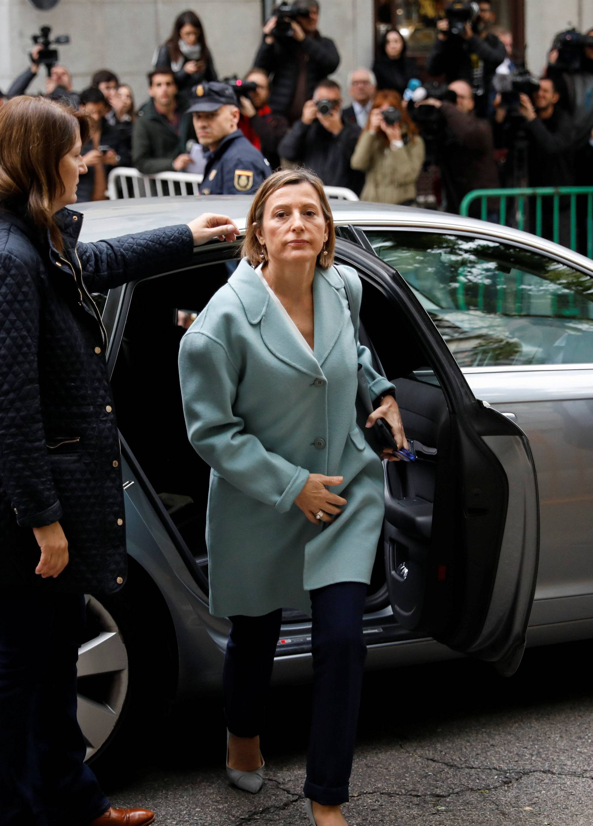 Speaker of Catalan parliament Carme Forcadell arrives to Spain's Supreme Court after being summoned to testify on charges of rebellion, sedition and misuse of public funds in Madrid