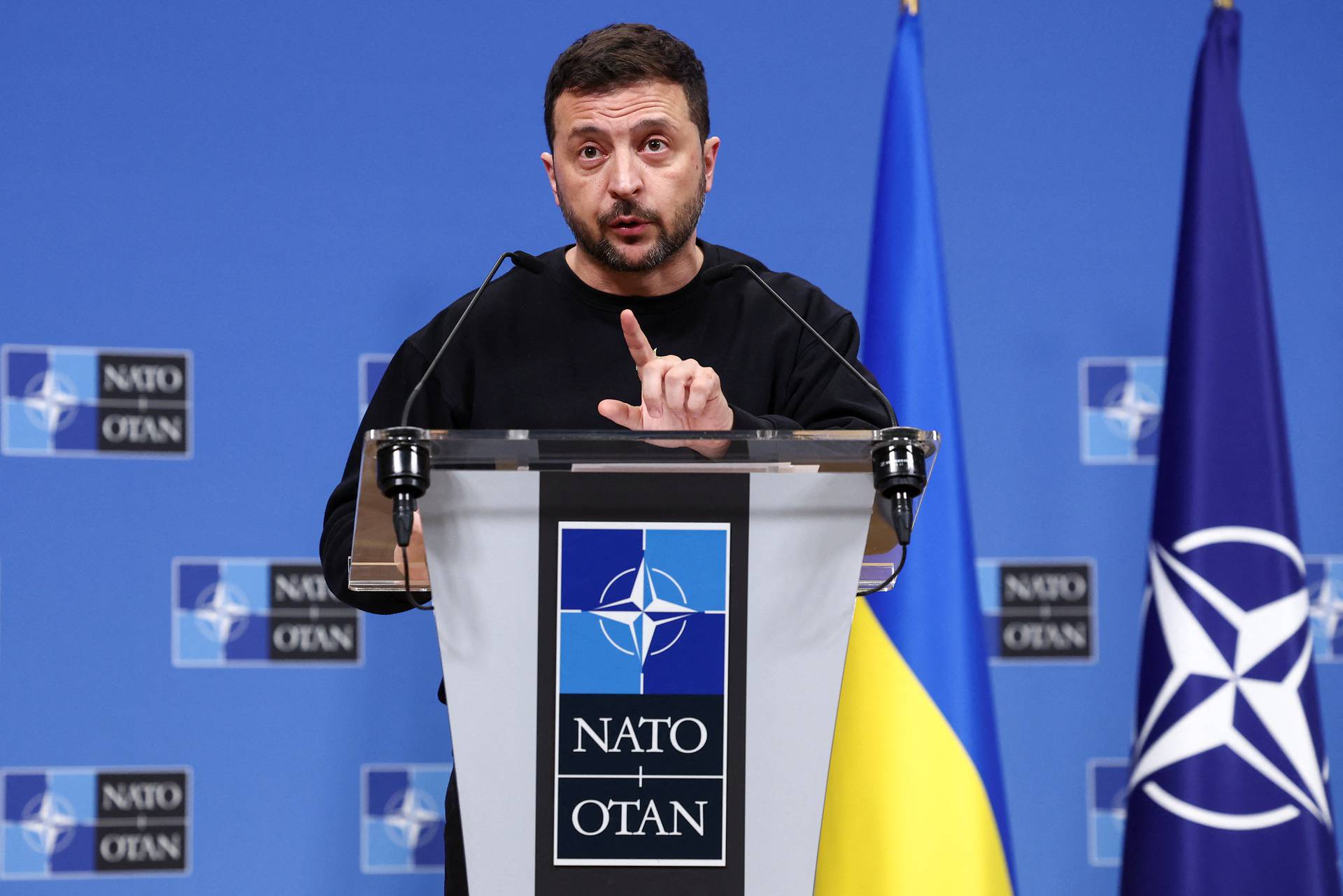 Ukraine's President Volodymyr Zelenskiy attends a press conference, in Brussels