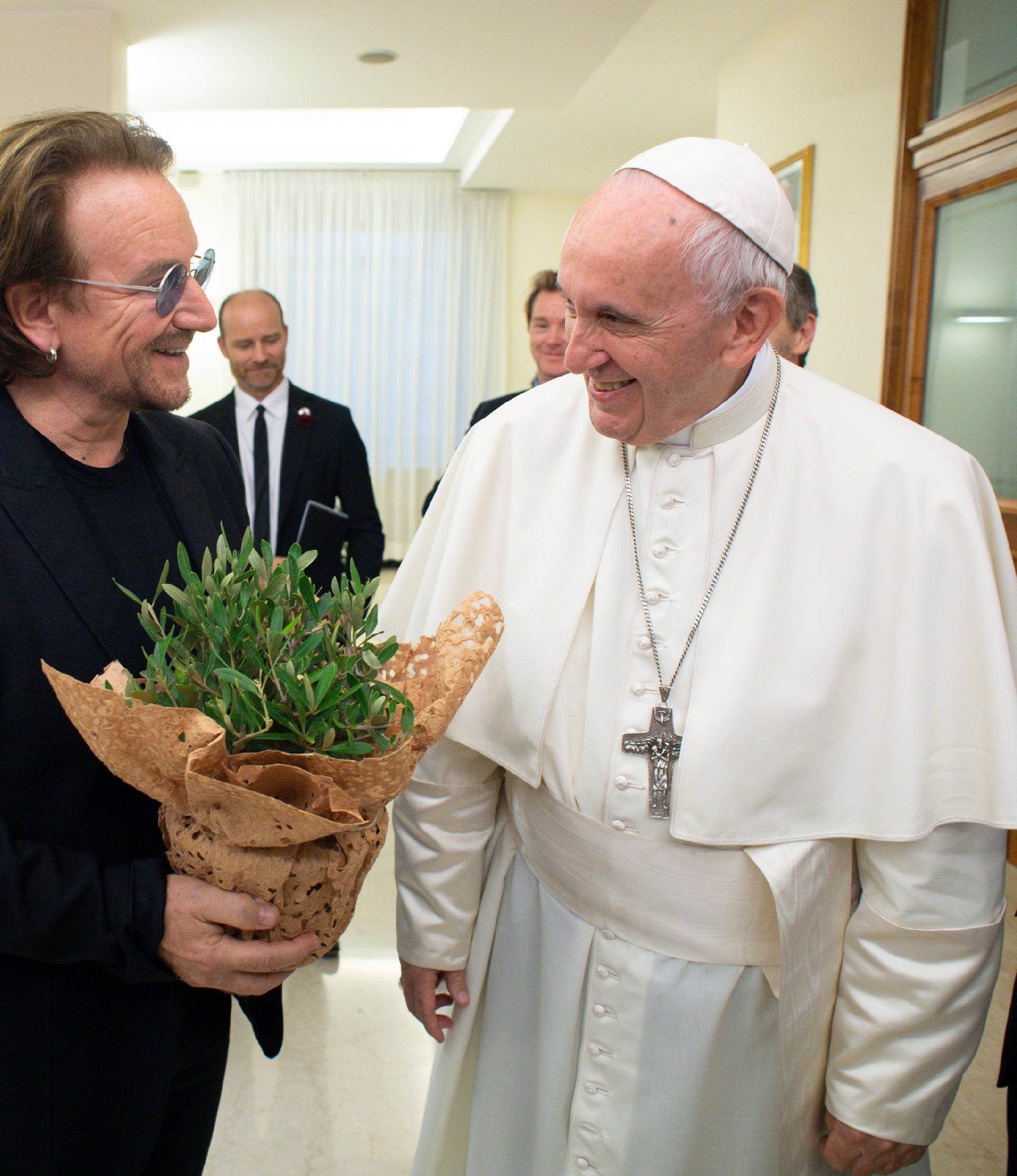 U2 rock band frontman Bono Vox meets Pope Francis at the Vatican