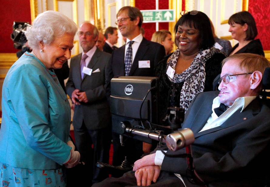 FILE PHOTO: Britain's Queen Elizabeth meets Hawking during reception for Leonard Cheshire Disability charity at St James's Palace in London