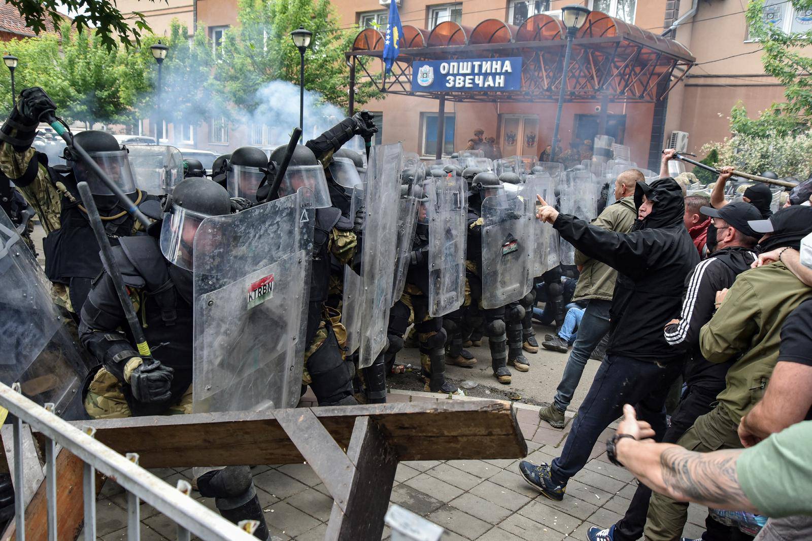 NATO Kosovo Force (KFOR) soldiers clash with local Kosovo Serb protesters in the town of Zvecan