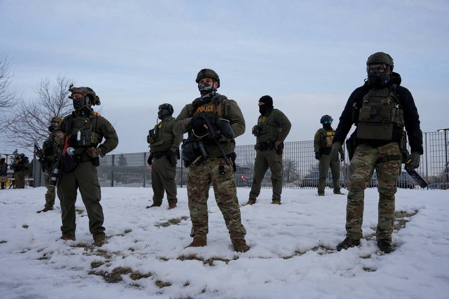 People protest against the fatal shooting of Renee Nicole Good by an ICE agent, in Minneapolis