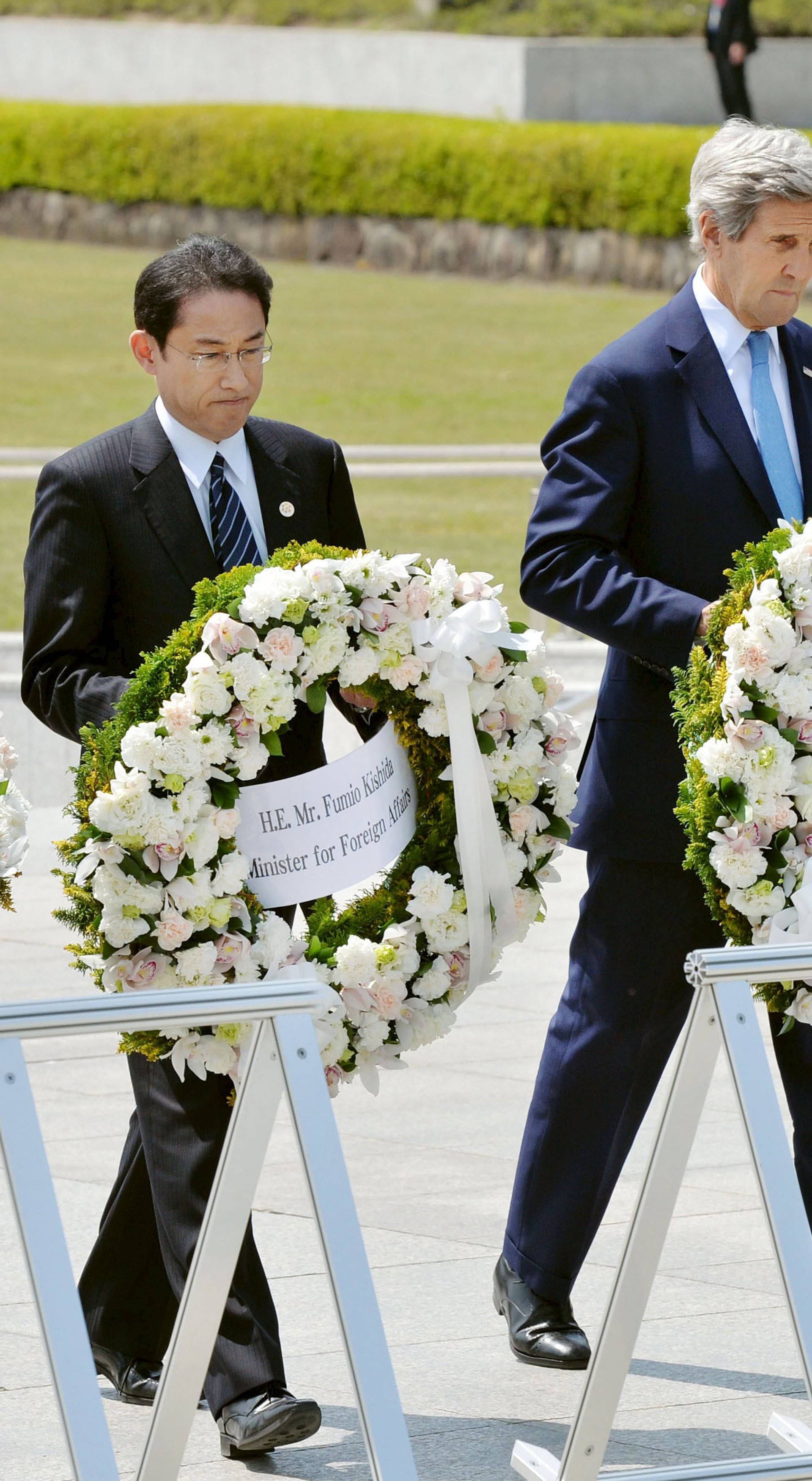 U.S. Secretary of State Kerry prepares to lay a wreath at the cenotaph with G7 FMs at Hiroshima Peace Memorial Park and Museum in Hiroshima