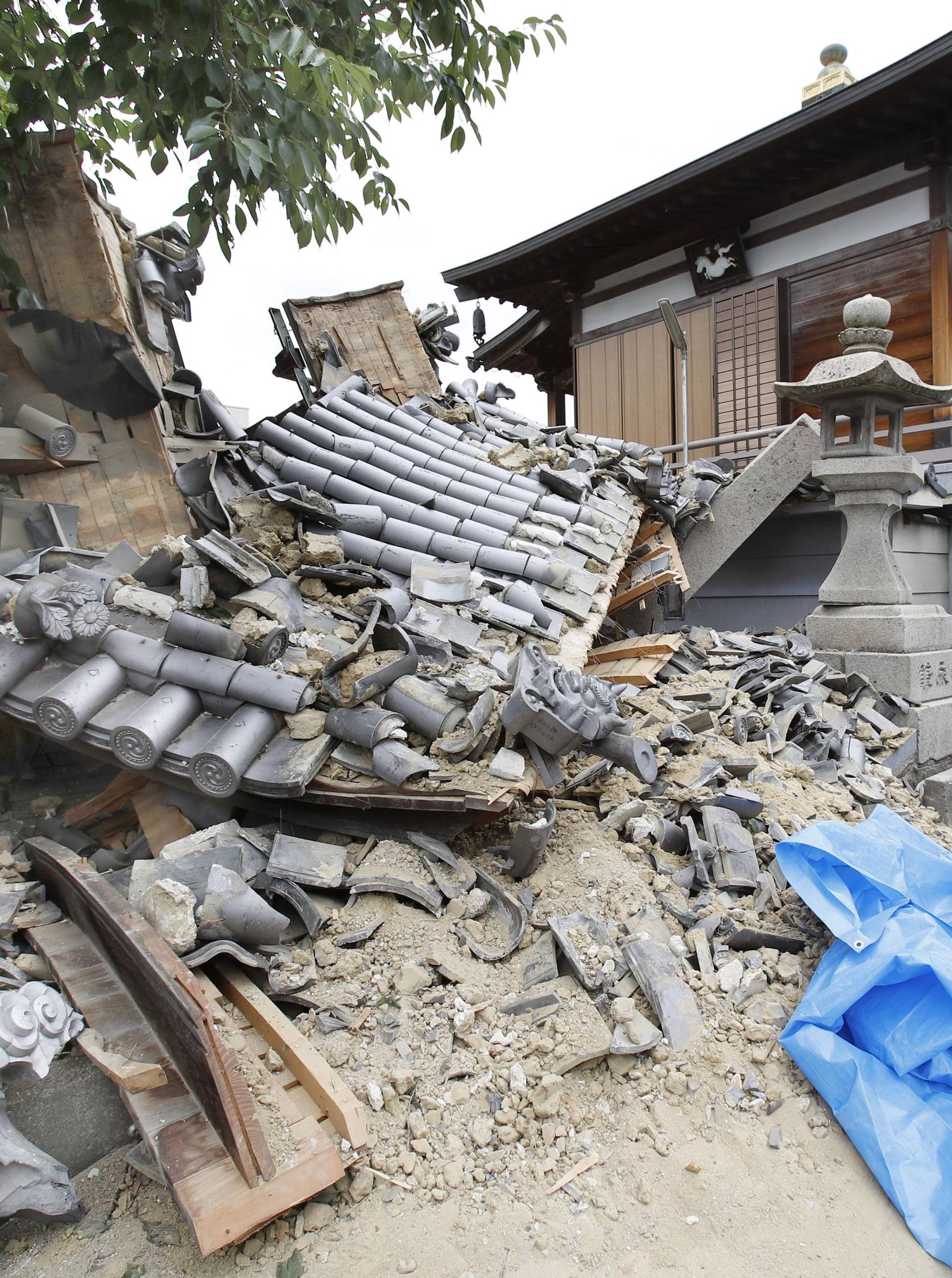 Damaged Myotoku-ji temple caused by an earthquake is seen in Ibaraki, Japan