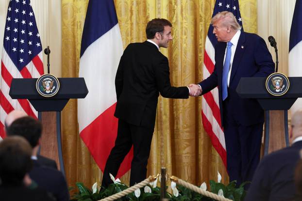 U.S. President Donald Trump and French President Emmanuel Macron hold a press conference, in Washington