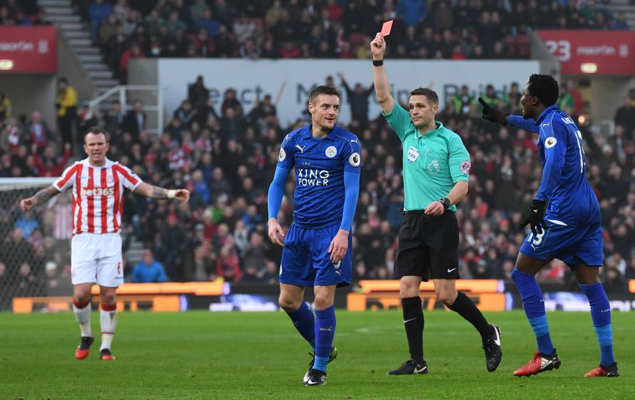 Leicester City's Jamie Vardy is shown a red card by referee Craig Pawson