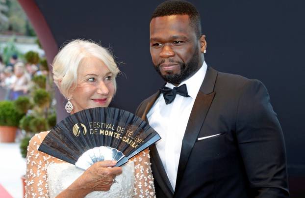 Actor Mirren poses with actor and singer "50 Cent" before the closing ceremony of the 57th Monte-Carlo Television Festival in Monaco