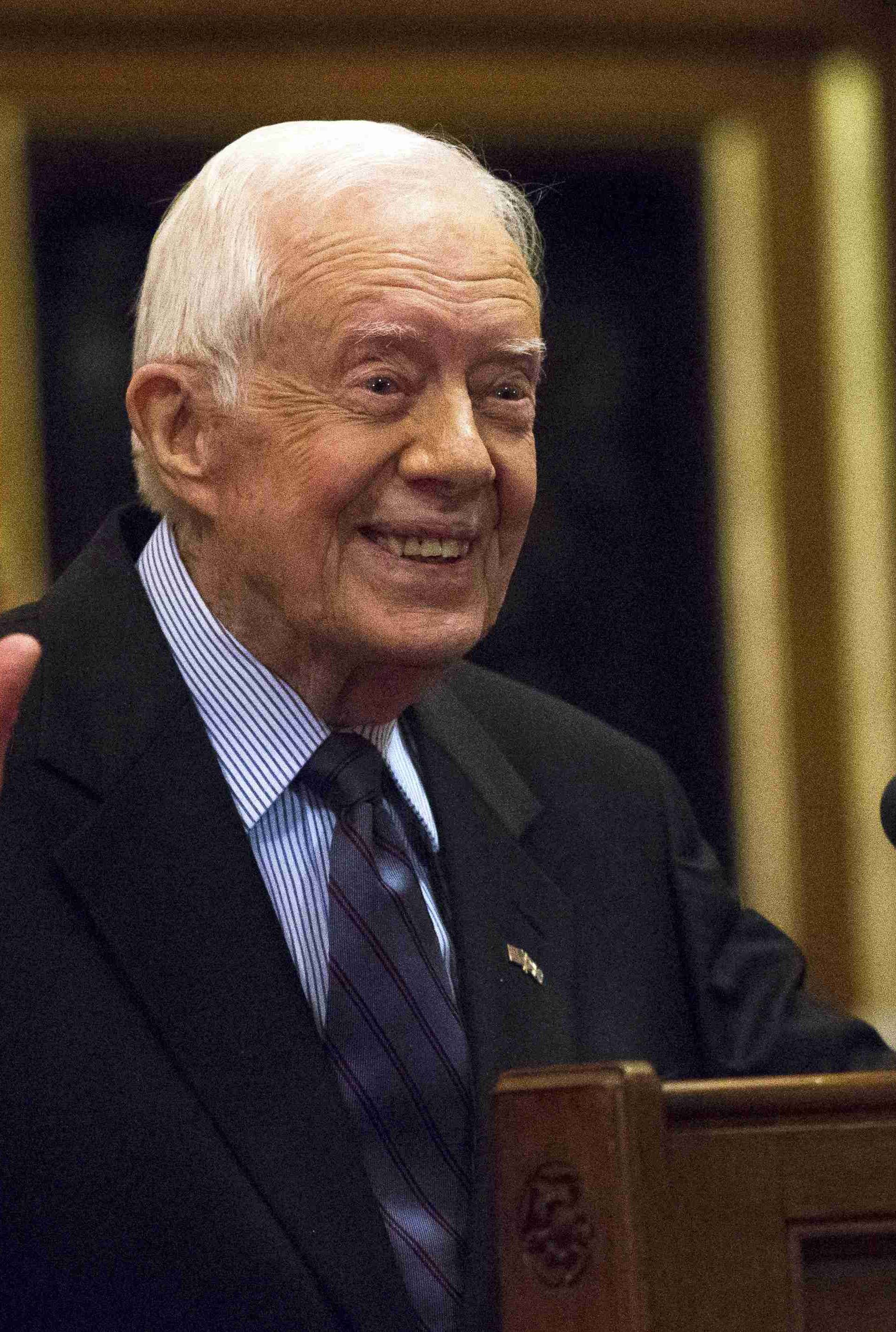 Former U.S. President Jimmy Carter delivers a lecture on the eradication of the Guinea worm, at the House of Lords in London