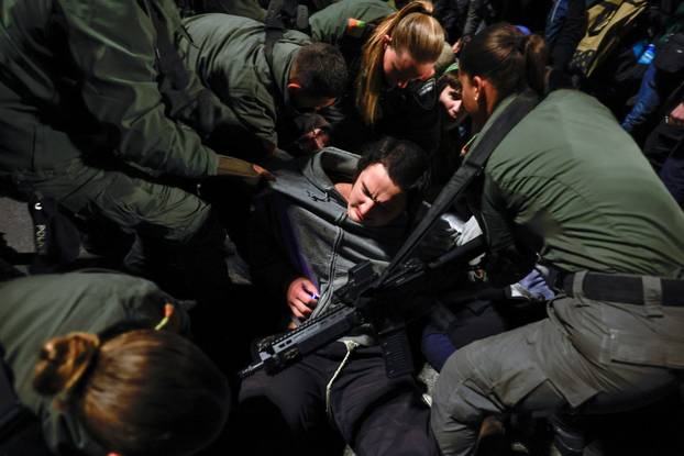 Israelis protest a ceasefire deal, in Jerusalem