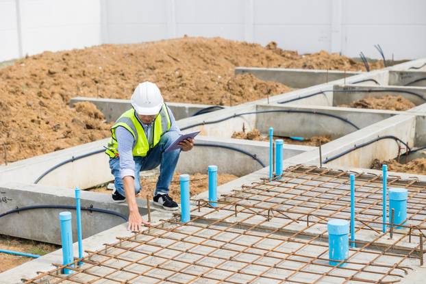 Asian,Construction,Engineer,,Japanese,Builder,Worker,Male,Working,Inspecting,Footing